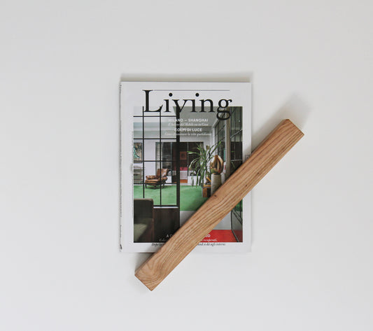 Floating wooden shelf. Modern rack for magazines or books. SLICE